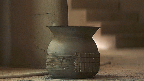 Baby Yoda Sticking Head Out of Clay Pot