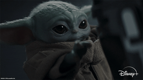 Baby Yoda Touching Helmet GIF