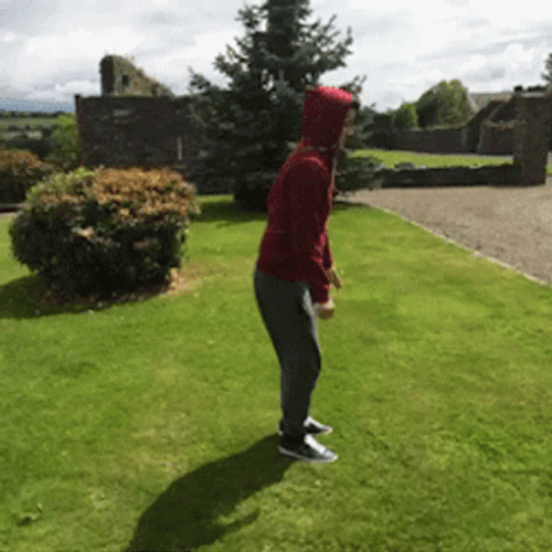 Backflip In The Grass GIF
