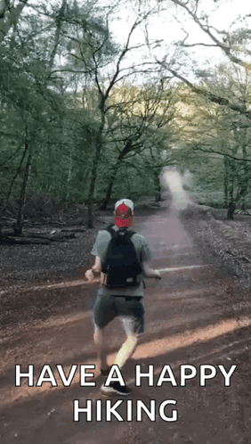 Backpacker On Dirt Path Saying Have Happy Hiking GIF