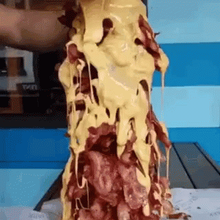 Bacon and Cheese Pile Poured on Plate