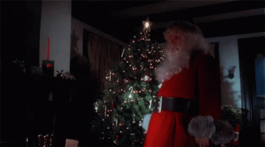 Bad Santa Holding A Knife GIF
