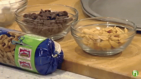 Bag Of Rock N Rolls Beside Bowls Of Food GIF