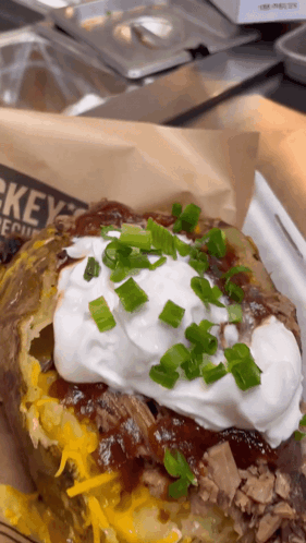 Baked Potato With Sour Cream And Onions GIF