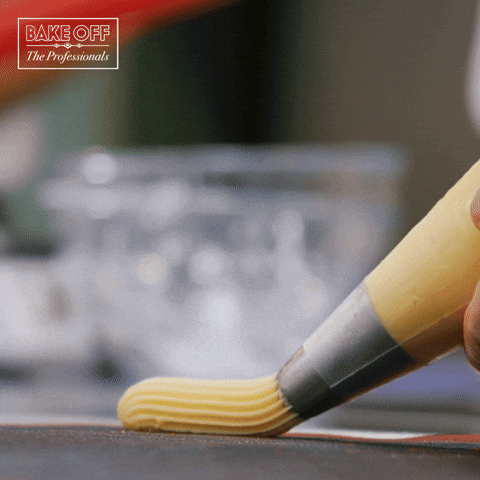 Baker Putting Neat Icing GIF