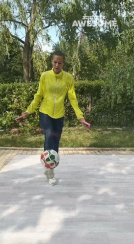 Balancing Soccer Ball Performing Jumping Rope GIF