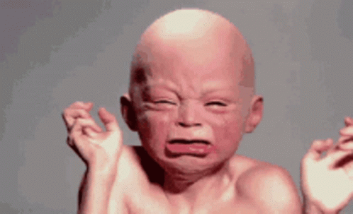 Bald Baby Crying With Mouth Open GIF