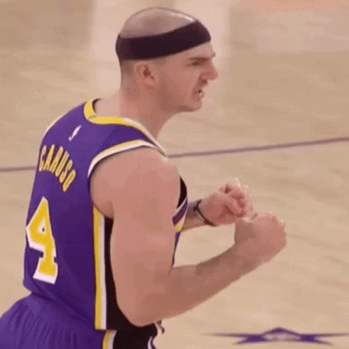 Bald Basketball Player in Purple Jersey and Headband