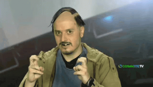 Bald Bearded Man In Front Of Cosmote TV GIF
