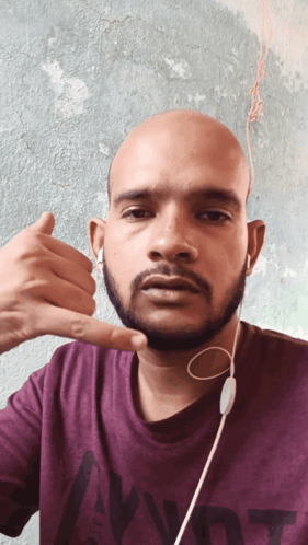 Bald Bearded Man In Purple Tommy Shirt GIF