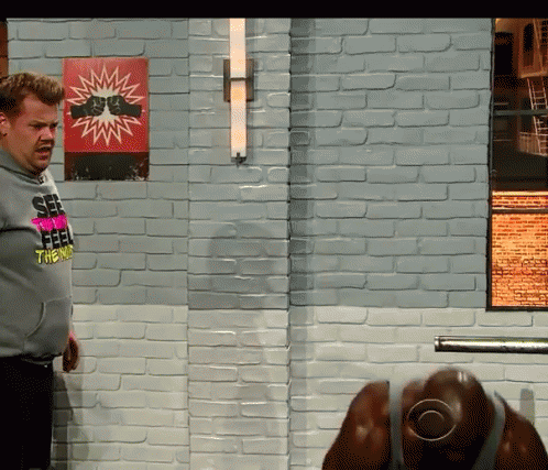 Bald Guy Holds Dumbbell Single Leg Deadlift GIF