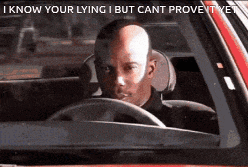 Bald Man Driving Car Saying I Know You're Lying GIF