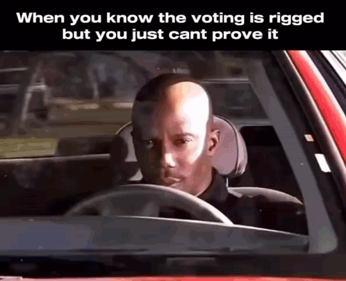 Bald Man Driving Car Saying When You Know the Voting Is Rigged but You Just Cant Prove It