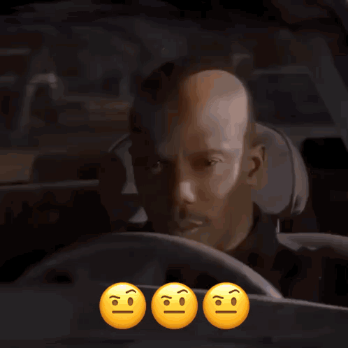 Bald Man Driving Car With Three Smiley Faces