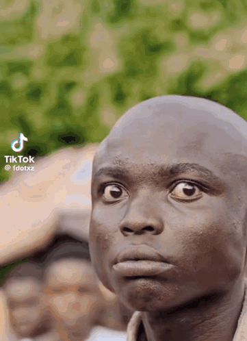 Bald Man Face With TikTok Logo