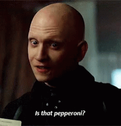 Bald Man Holding Paper Says Is That Pepperoni