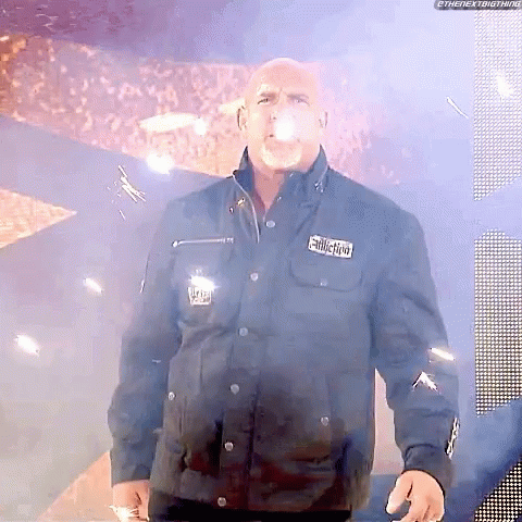Bald Man in Black Jacket With Addiction Patch