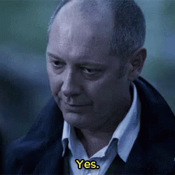 Bald Man In Blue Jacket Talking To Another Man GIF