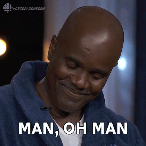Bald Man in Blue Robe Smiling Says Man Oh Man