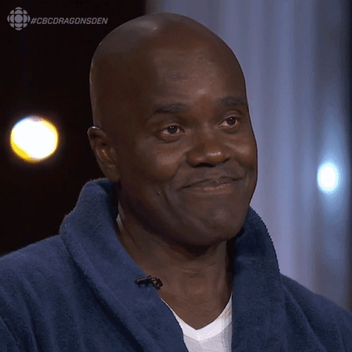 Bald Man in Blue Robe With #cbcdragonsden
