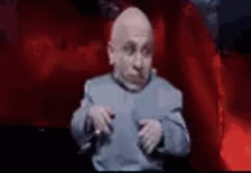 Bald Man in Blue Suit Funny Face Red Curtain