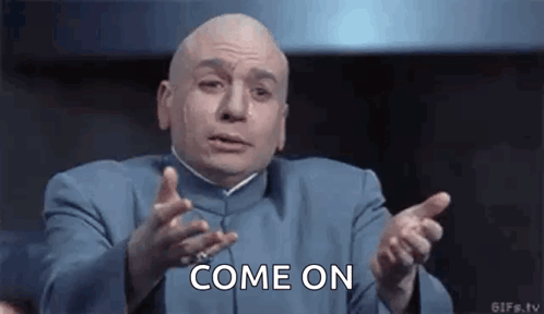 Bald Man in Blue Suit Saying Come On