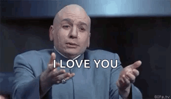 Bald Man in Blue Suit Saying I Love You