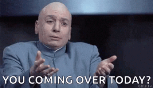 Bald Man in Blue Suit Saying You Coming Over Today