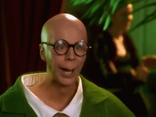 Bald Man In Glasses And Green Jacket Smiling GIF