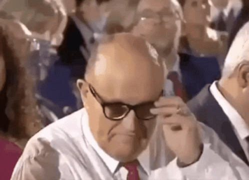 Bald Man in Glasses and Tie