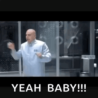 Bald Man in Lab Coat Saying Yeah Baby
