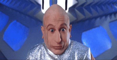 Bald Man in Silver Making Face