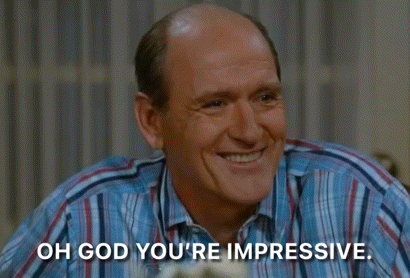 Bald Man in Striped Shirt Saying Oh God Youre Impressive