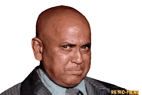 Bald Man in Suit and Tie