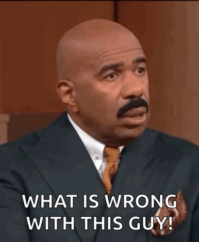 Bald Man In Suit Asking What's Wrong GIF