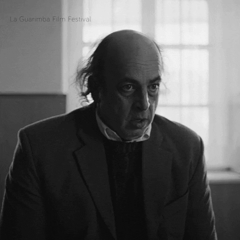 Bald Man in Suit at La Guarimba Film Festival