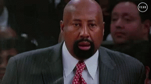 Bald Man in Suit Looking