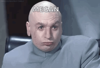 Bald Man in Suit Making Funny Face Megan