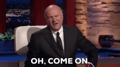 Bald Man in Suit Saying Oh Come On
