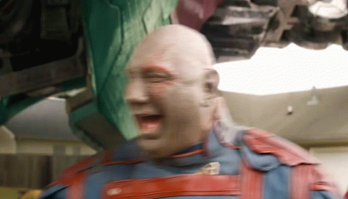 Bald Man In Superhero Costume Laughing GIF