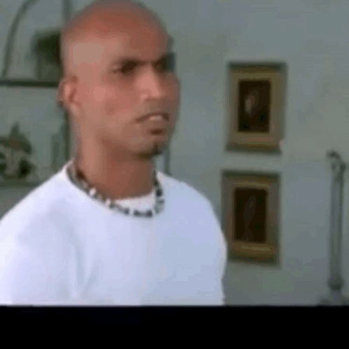 Bald Man In White Shirt With Necklace GIF