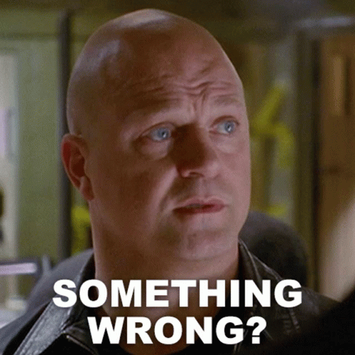 Bald Man Looking at Something Wrong