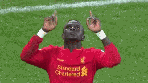 Bald Man On Soccer Field Watching Fireworks Night GIF