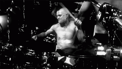 Bald Man Playing Drums