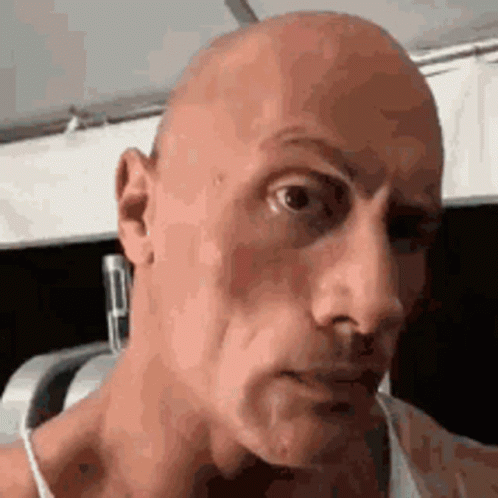 Bald Man's Serious Face