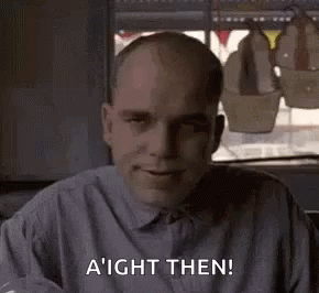 Bald Man Saying Aight Then At Table GIF