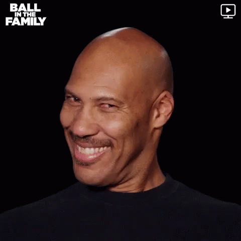 Bald Man Saying I Like You in Black Shirt