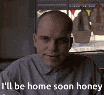 Bald Man Saying I'll Be Home Soon Honey GIF