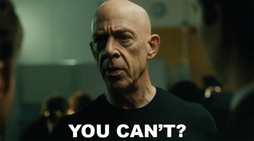 Bald Man Saying You Cant to Another Man
