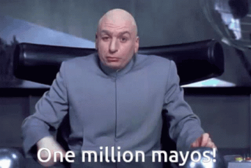 Bald Man Sitting in Chair Saying One Million Mayonnaise